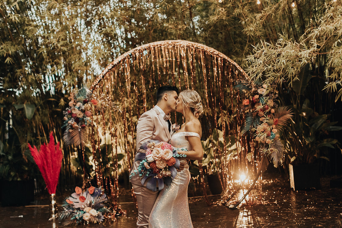 90's themed wedding photoshoot in tropical pastel iridescent color palette.