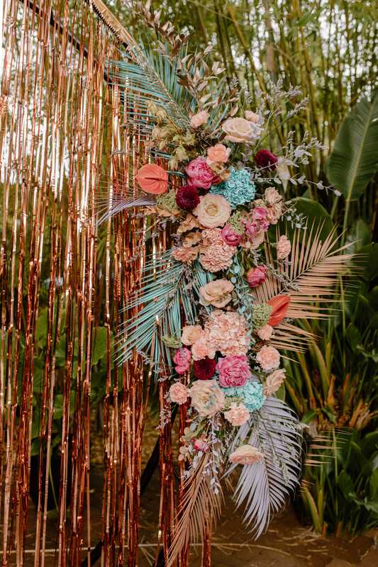 Colorful pastel wedding arch flowers. Large arrangements for a mixed tropical garden wedding at Nova 535 in downtown St Petersburg, Florida.