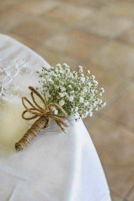 Simple baby's breath pin on boutonniere.