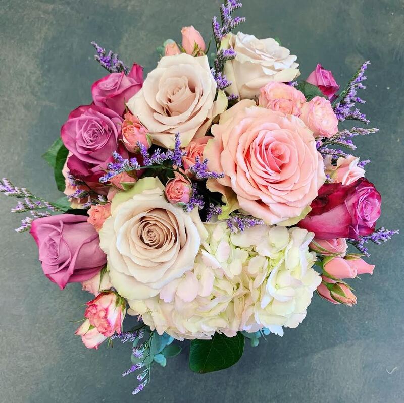 Fun and flirty bridal flower bouquet for romantic pink and lavender wedding.